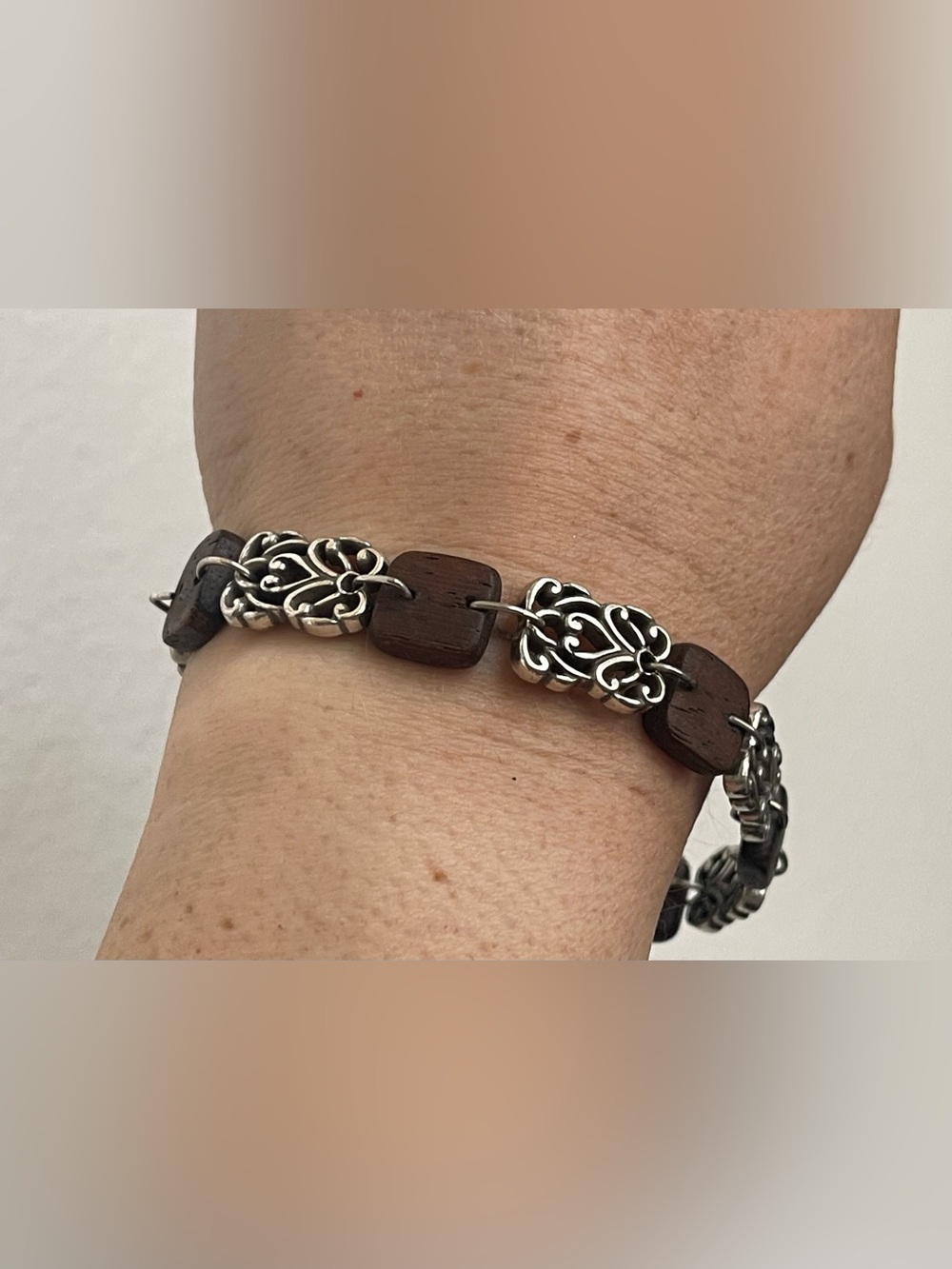Silver tone scroll panel  Katu Sequoia Wood Floral Link Bracelet